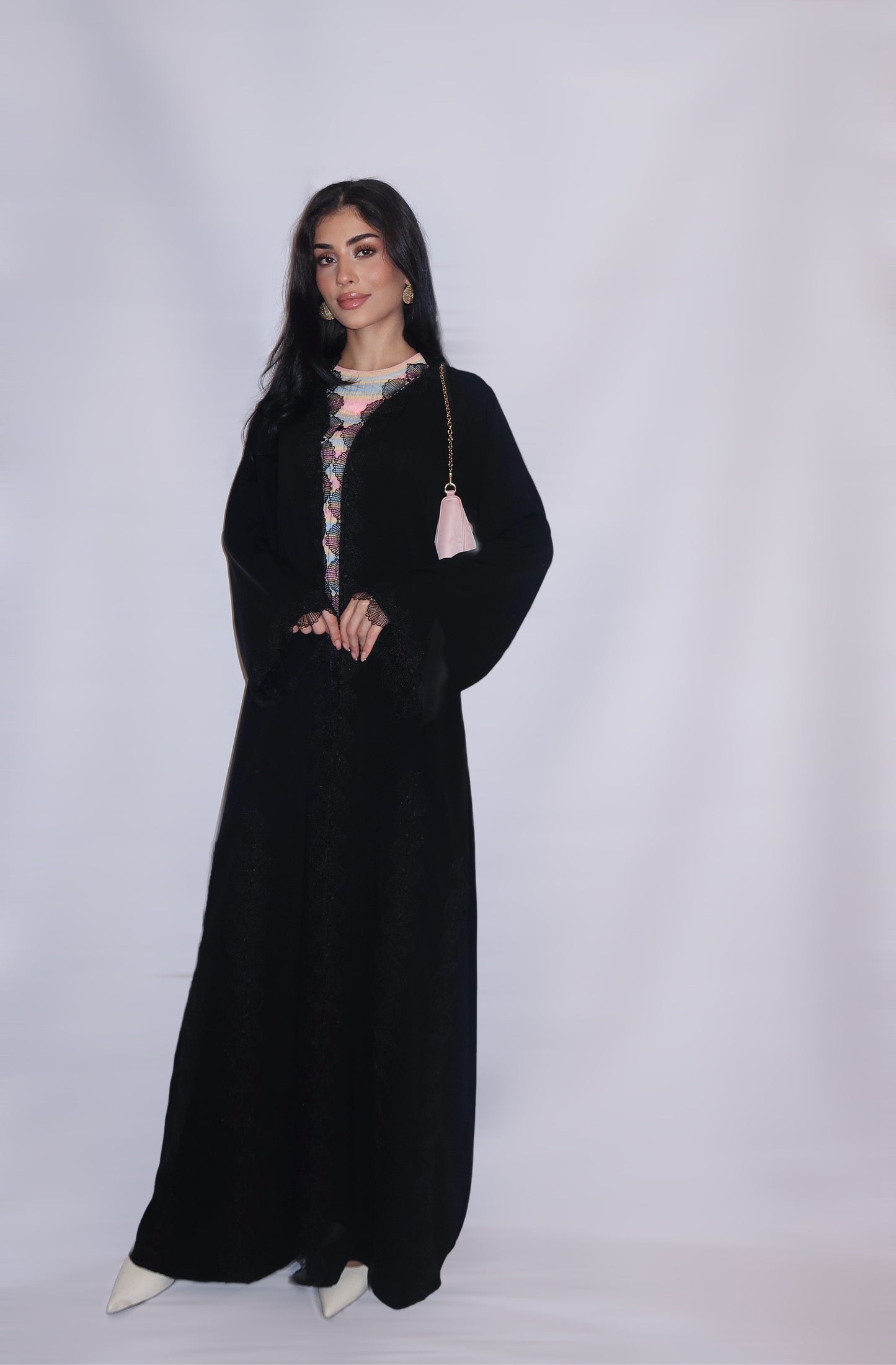 Classic black nida abaya finished with scalloped guipure lace edging, full length