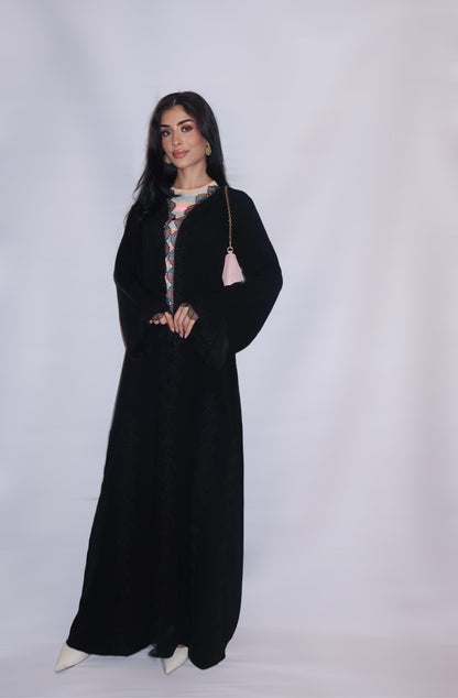 Classic black nida abaya finished with scalloped guipure lace edging, full length