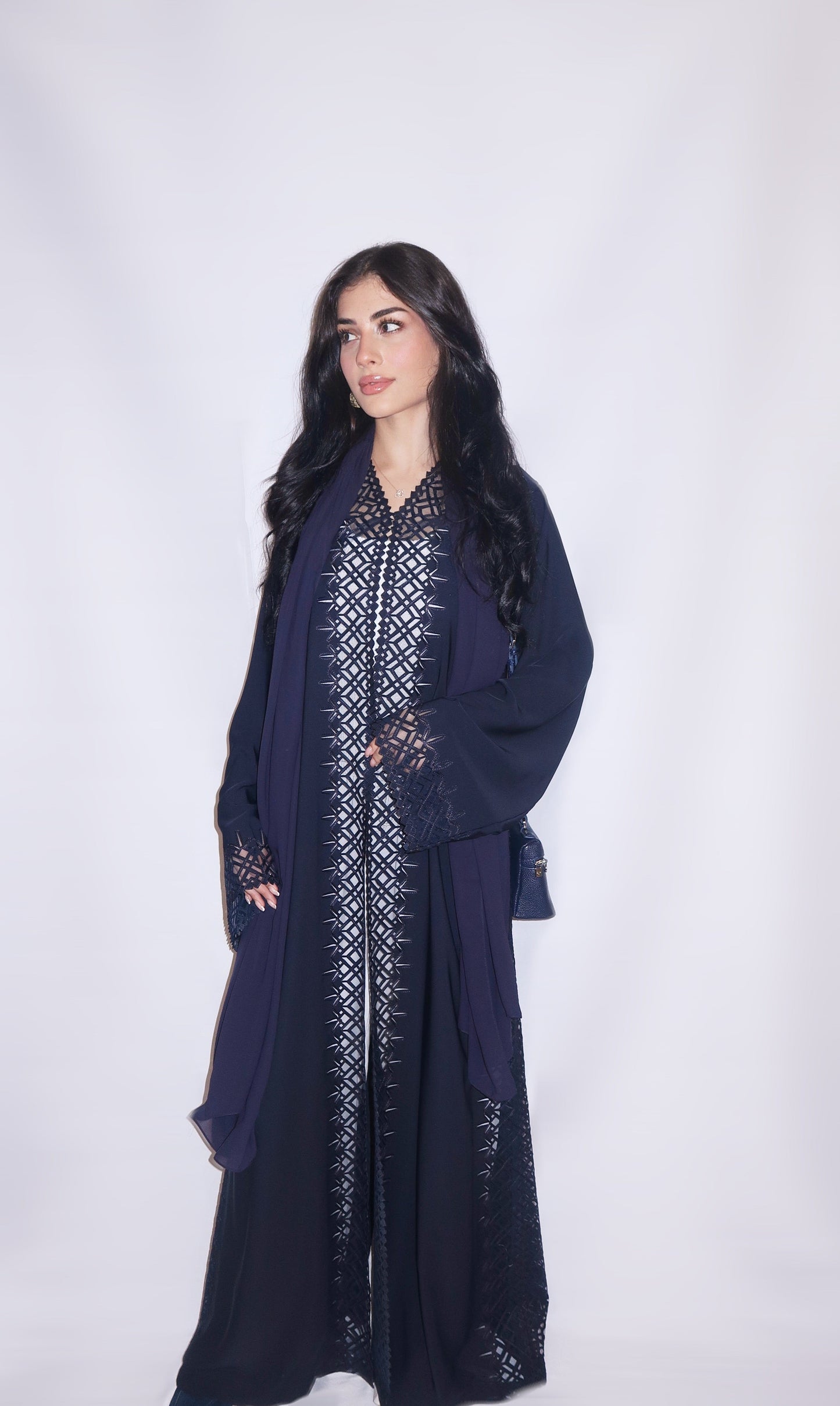 Hind abaya, navy with geometric lattice bands over white, full length